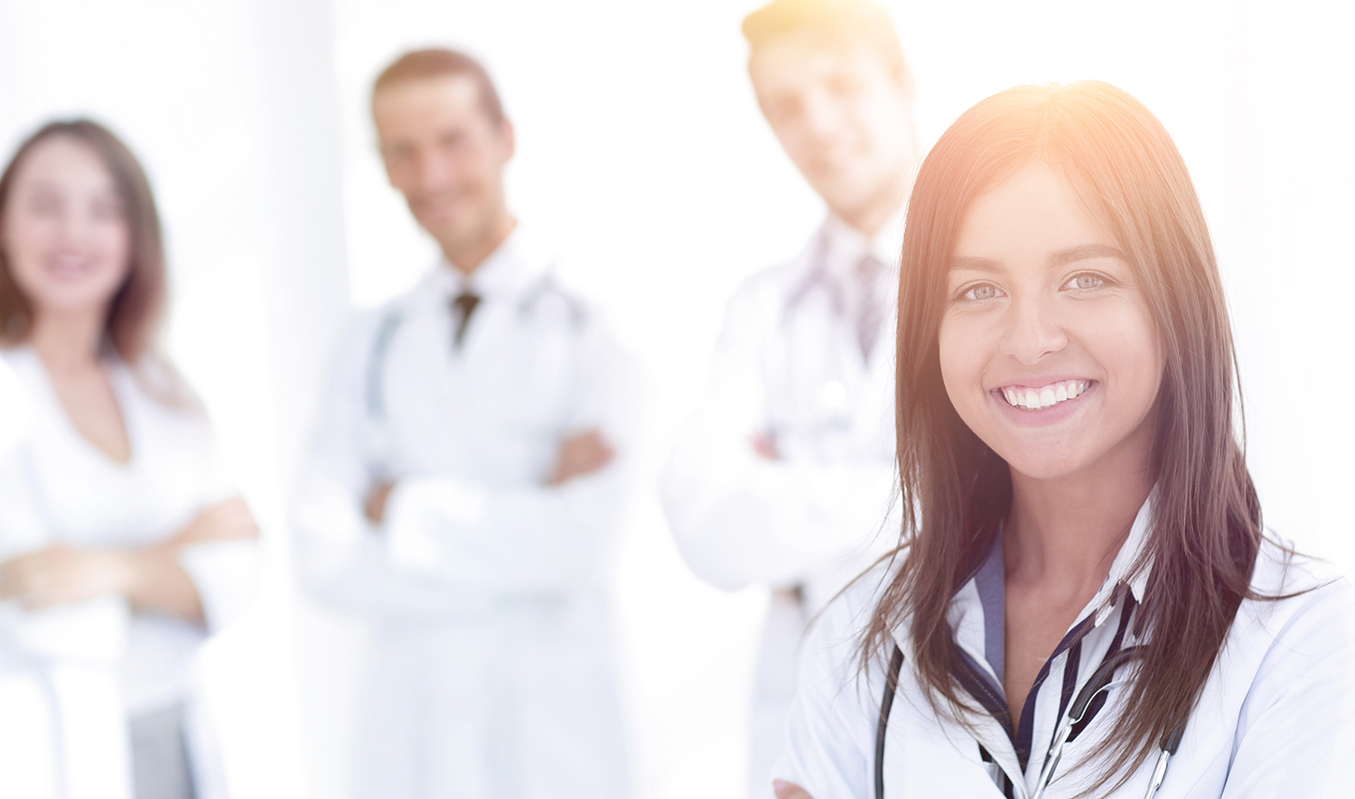 Dosimeter wearers standing and smiling